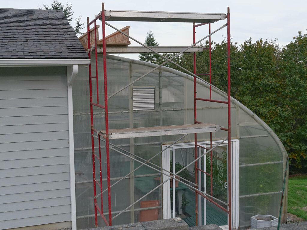 RV Garage siding work showing scaffold and catwalk. Left side, October 2015.